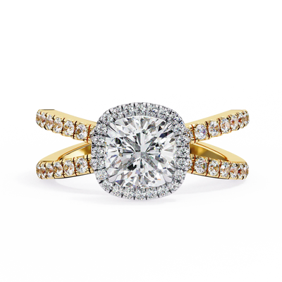 Gold ring with a large diamond and smaller diamonds on the band against a white background