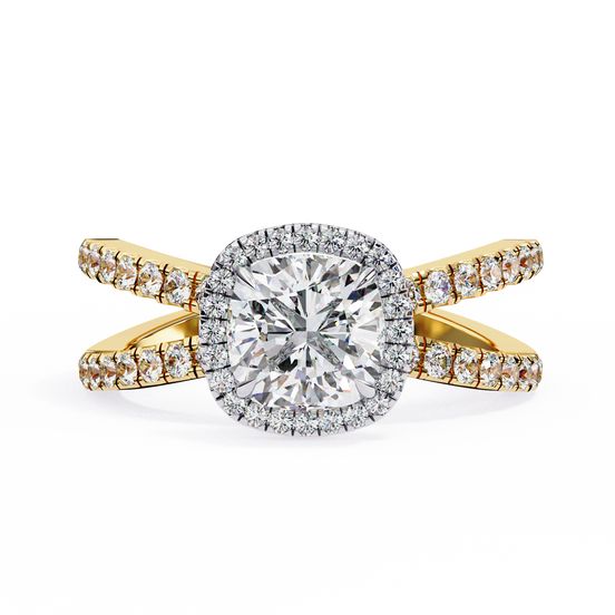 Gold ring with a large diamond and smaller diamonds on the band against a white background