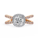Gold ring with a large diamond and smaller diamonds on the band against a white background