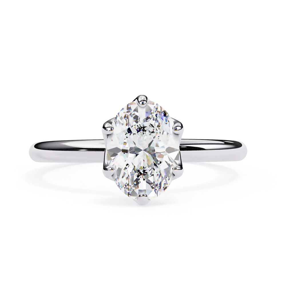 Diamond ring with a pear-shaped gemstone on a white background