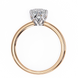 Rose gold ring with a diamond on a white background