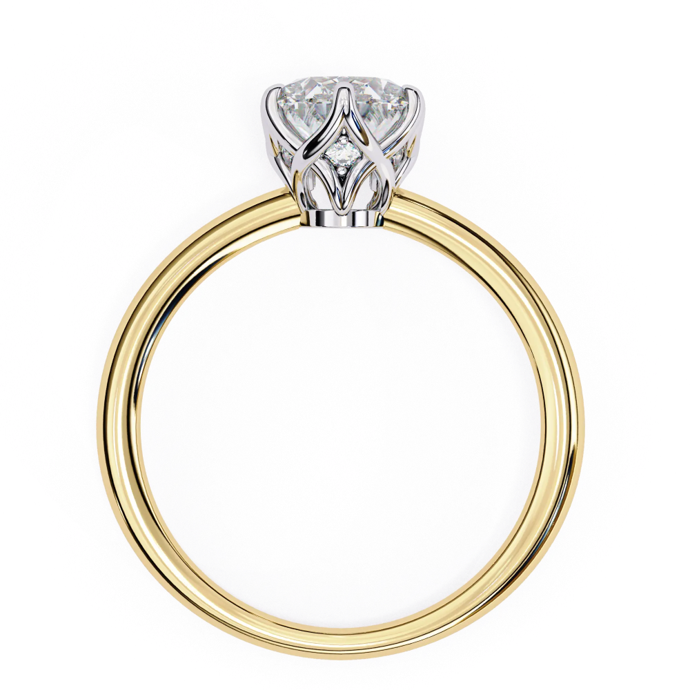 Two-tone gold ring with a diamond on a white background