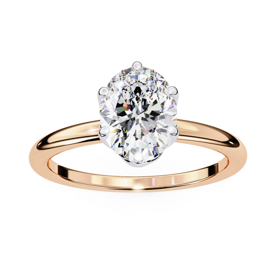 Rose gold ring with a large diamond on a white background