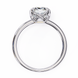 Silver ring with a heart-shaped diamond on a white background
