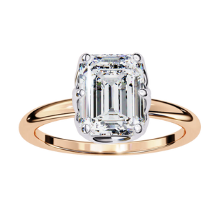 Rose gold ring with a large diamond on a white background