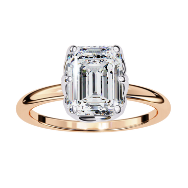 Rose gold ring with a large diamond on a white background