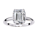 Diamond ring with a emerald-cut diamond on a white background