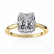 Gold ring with a large diamond on a white background