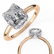 Two rose gold diamond rings on a white background