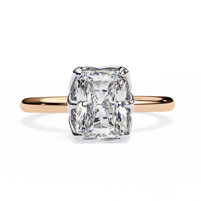 Rose gold ring with a large diamond on a white background
