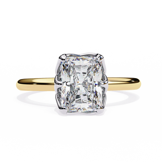 Gold ring with a large diamond on a white background