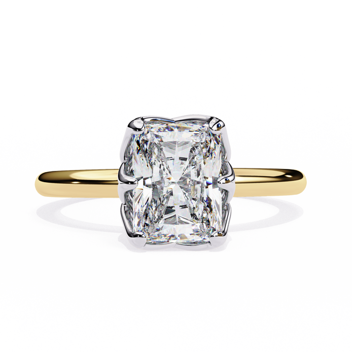 Gold ring with a large diamond on a white background