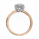 Classic round solitaire diamond engagement ring in white gold featuring a 1.56 CT round brilliant center stone with six-prong cathedral setting and hidden accent diamonds.
