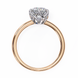 Classic round solitaire diamond engagement ring in white gold featuring a 1.56 CT round brilliant center stone with six-prong cathedral setting and hidden accent diamonds.