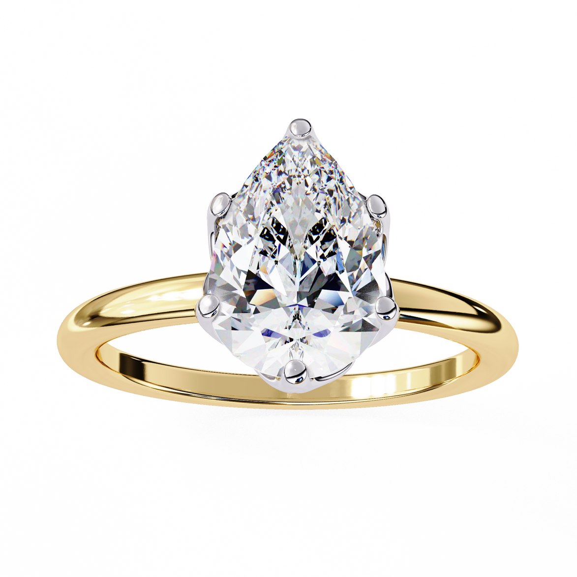 Gold ring with a pear-shaped diamond on a white background