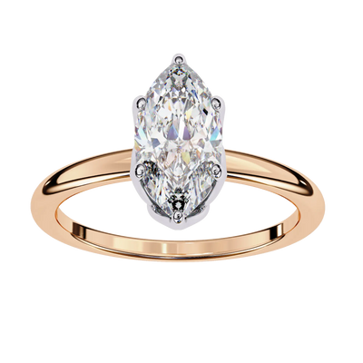 Rose gold ring with a pear-shaped diamond on a white background