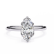 Diamond ring with a marquise-shaped gemstone on a white background