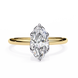 Gold ring with a marquise-shaped diamond on a white background