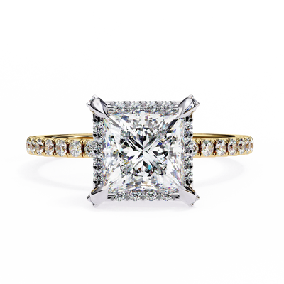 Diamond ring with a large central gemstone and smaller stones on a white background
