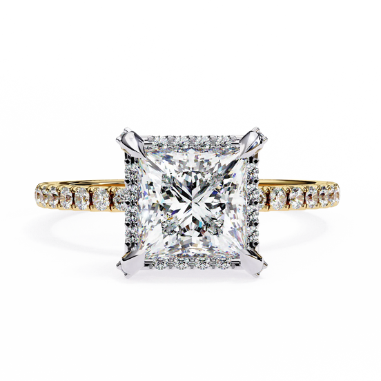 Diamond ring with a large central gemstone and smaller stones on a white background