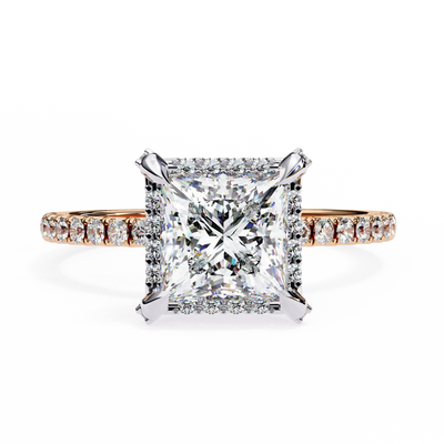 Diamond ring with a square-cut center stone on a white background