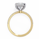 Gold ring with a heart-shaped diamond on a white background