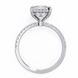 Diamond ring with a heart-shaped center stone on a white background