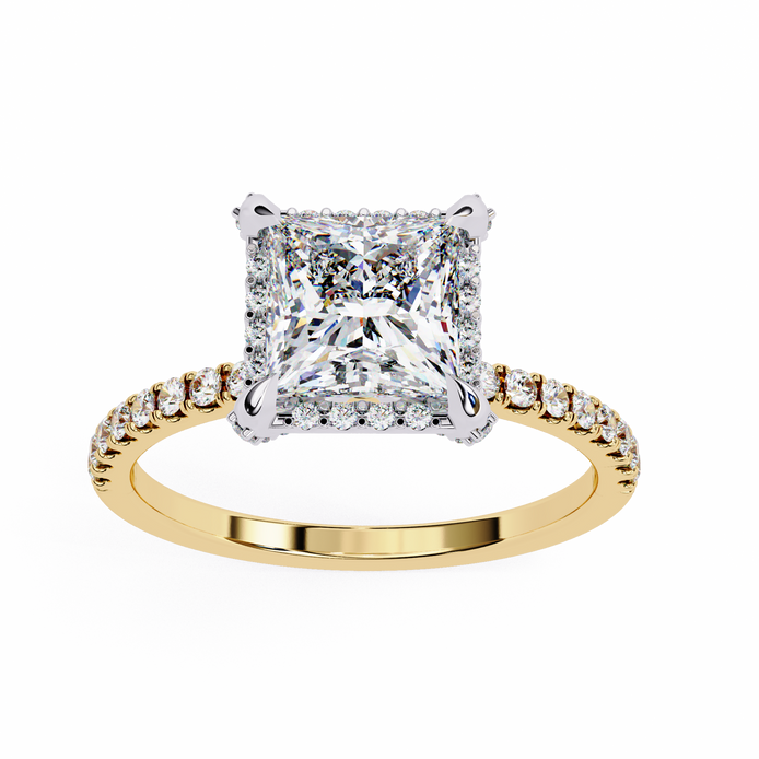 Gold ring with a large diamond and smaller diamonds on the band against a white background