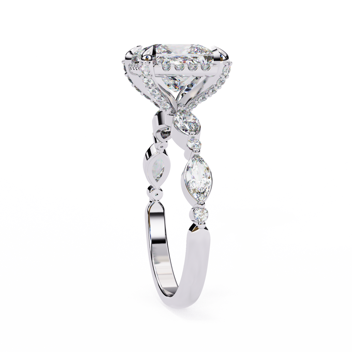 Diamond ring with a pear-shaped center stone on a white background