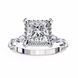 Diamond ring with a prominent princess-cut diamond on a white background