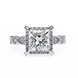 Diamond ring with a large central gemstone and smaller stones on a white background
