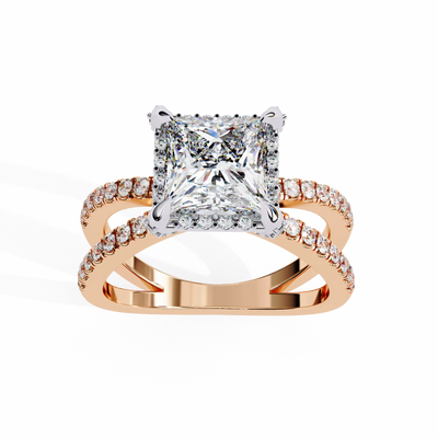 Rose gold ring with a large diamond and smaller diamonds on the band against a white background