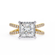Diamond ring with gold and silver band on a white background