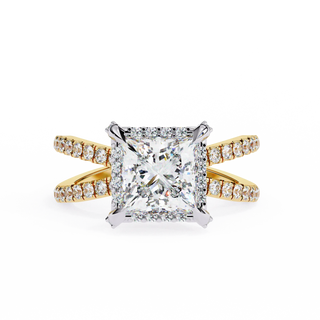 Diamond ring with gold and silver band on a white background
