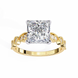 Yellow gold ring with a large diamond and smaller diamonds on the band against a white background