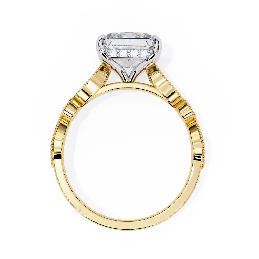 Gold ring with a diamond on a white background