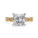 Gold ring with a large diamond and smaller diamonds on the band against a white background