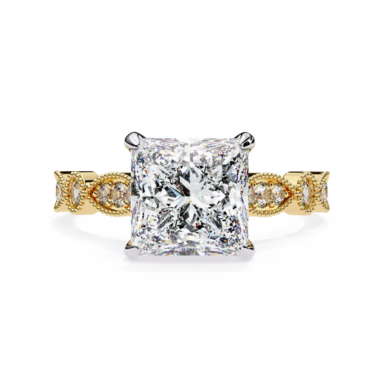 Gold ring with a large diamond and smaller diamonds on the band against a white background