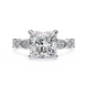 Diamond ring with a square-cut gemstone on a white background