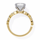 Gold ring with a diamond on a white background