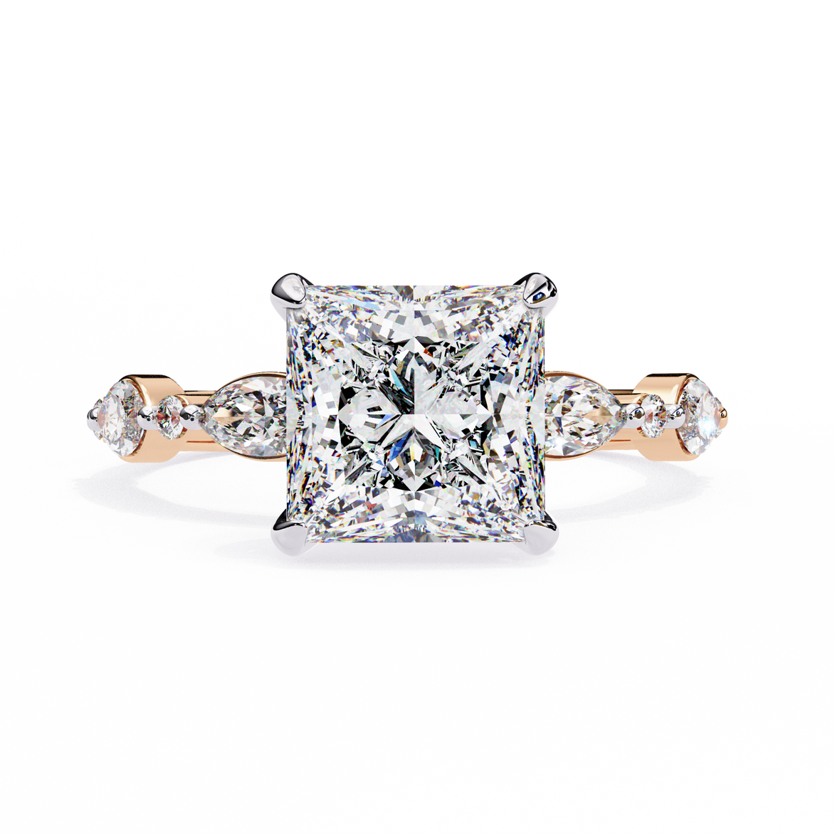 Diamond ring with a yellow gold band on a white background