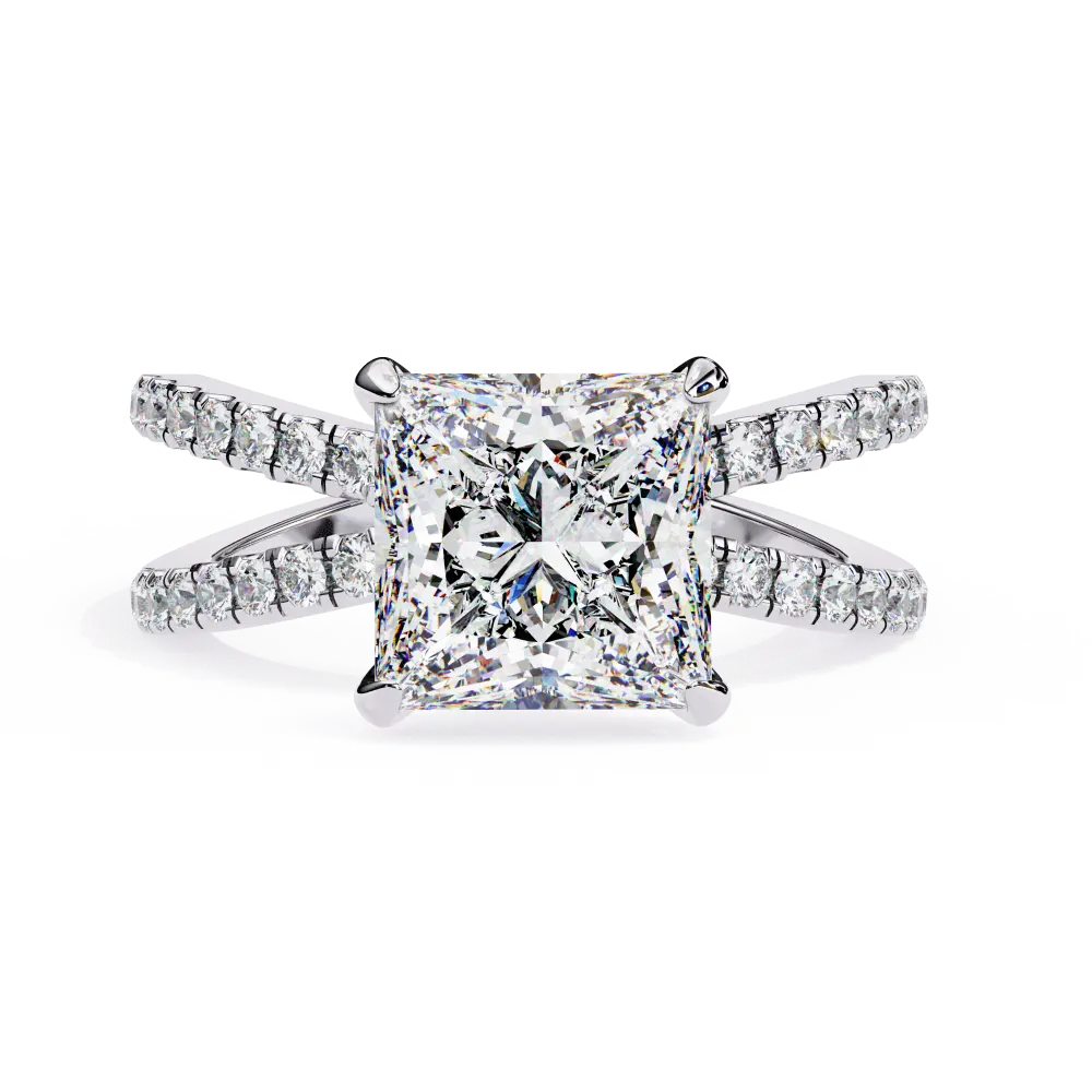 Diamond ring with a prominent central gemstone and smaller stones on the band against a white background