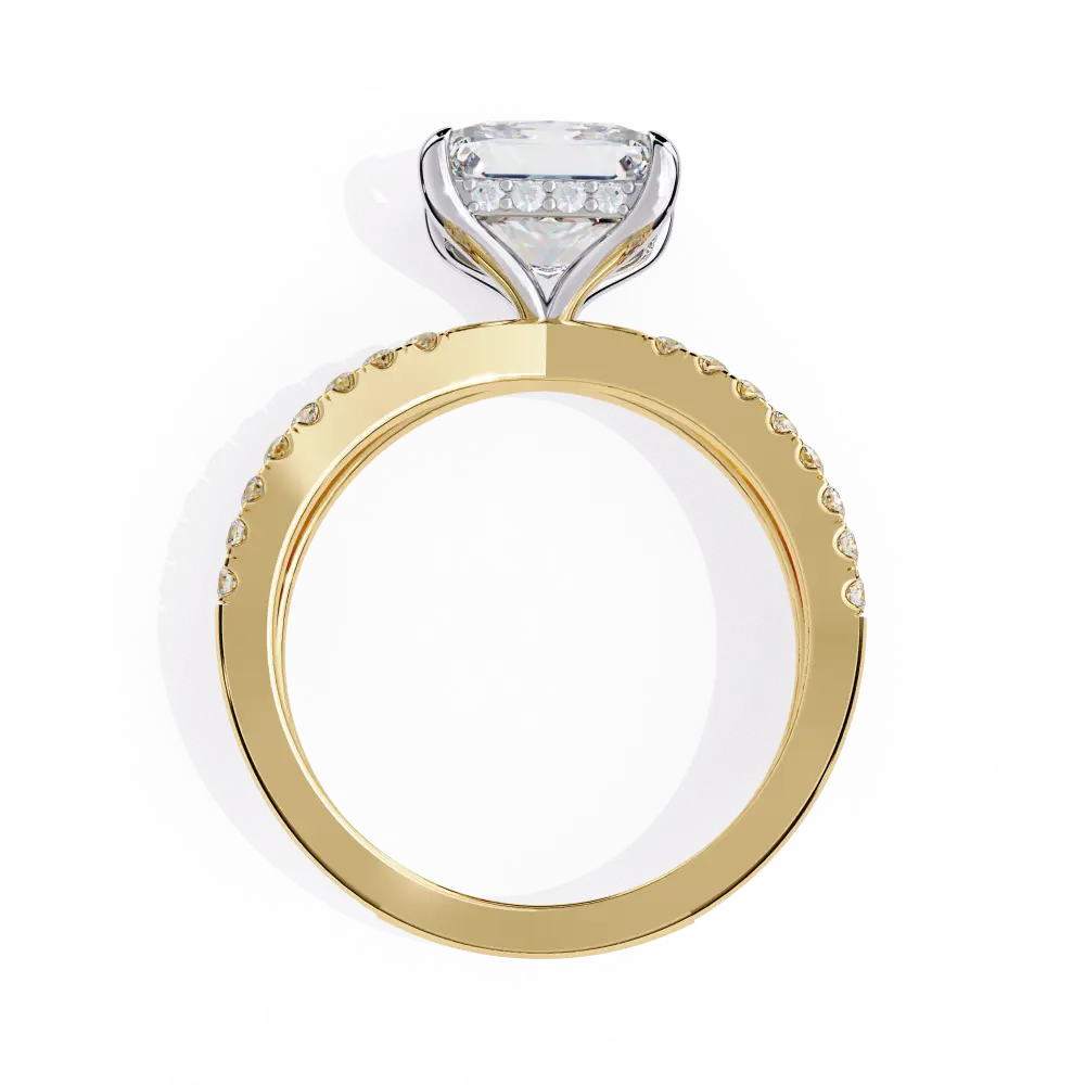 Gold ring with a diamond on a white background