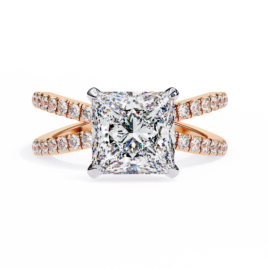 Rose gold ring with a large diamond and smaller diamonds on the band against a white background