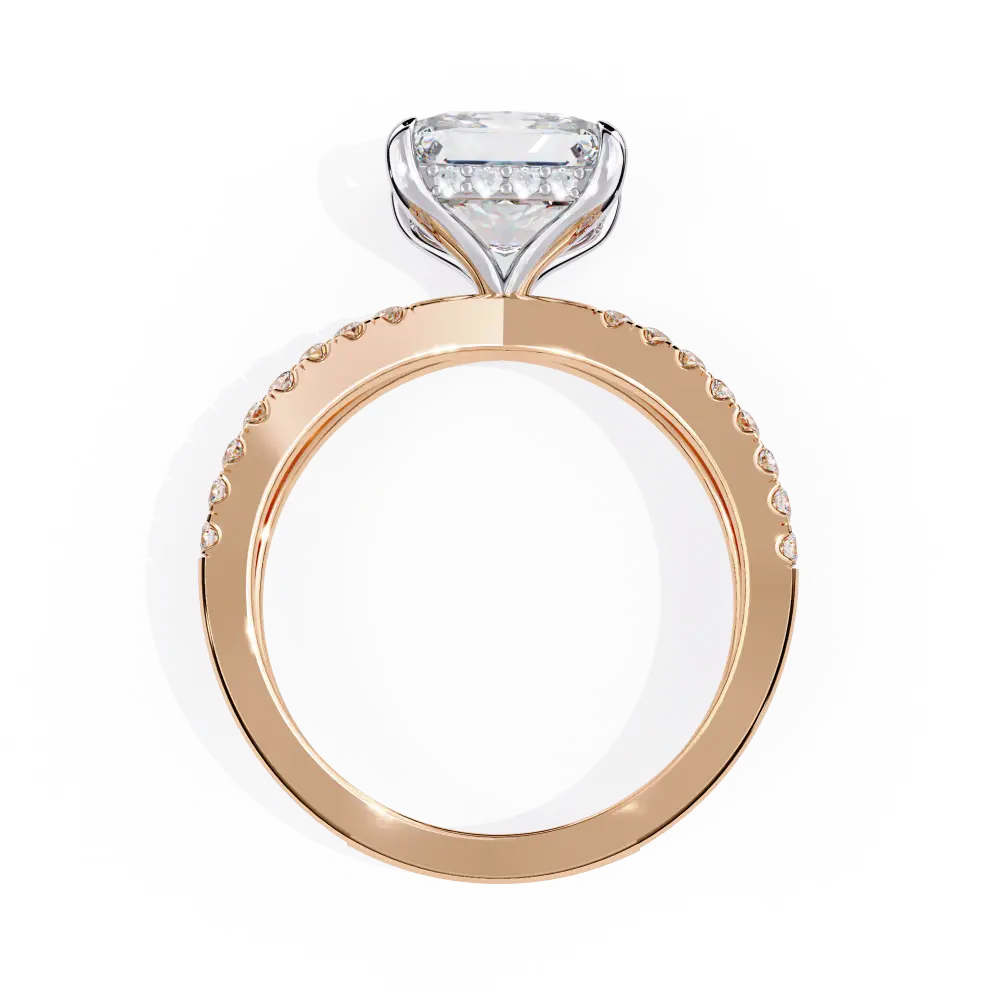 Rose gold ring with a diamond on a white background