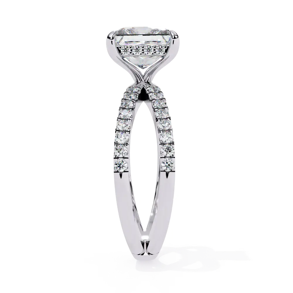 Diamond ring with a white gold band on a white background