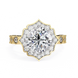 Gold ring with a large diamond and smaller diamonds on a white background