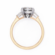 Gold ring with a diamond on a white background