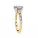 Gold ring with a diamond on a white background