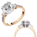 Rose gold diamond ring with a white gemstone on a white background